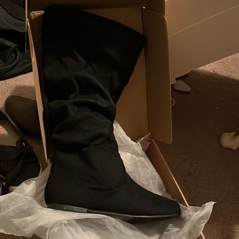 Black tall boots
